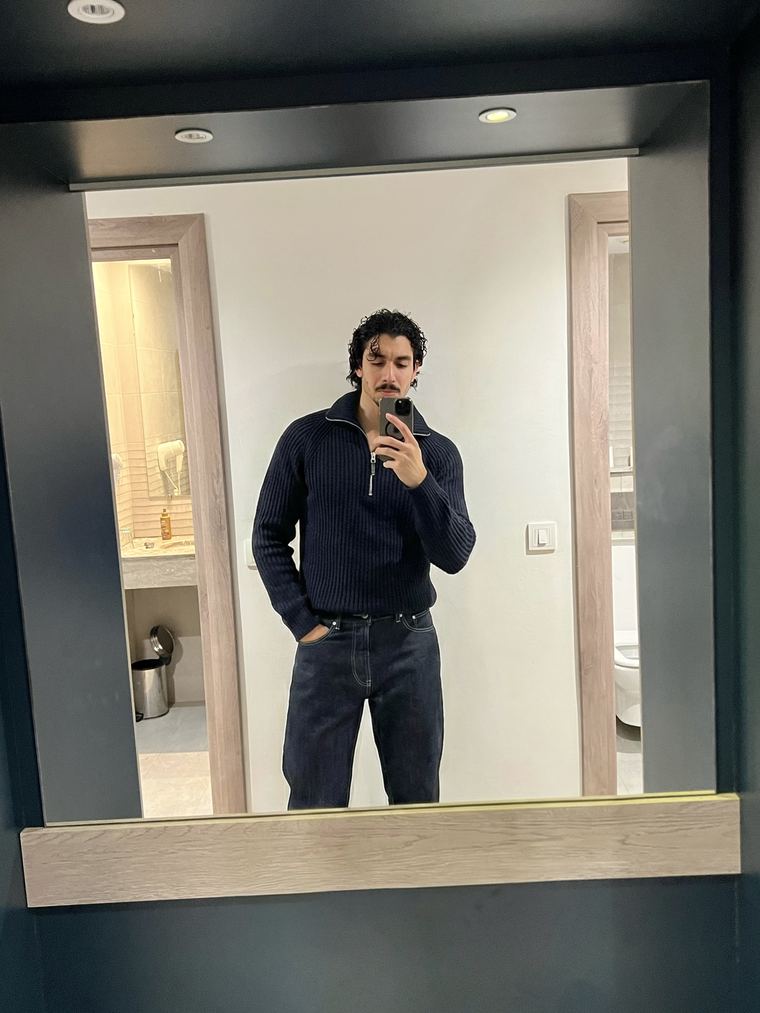 Hazem Telmoudi in a navy knit