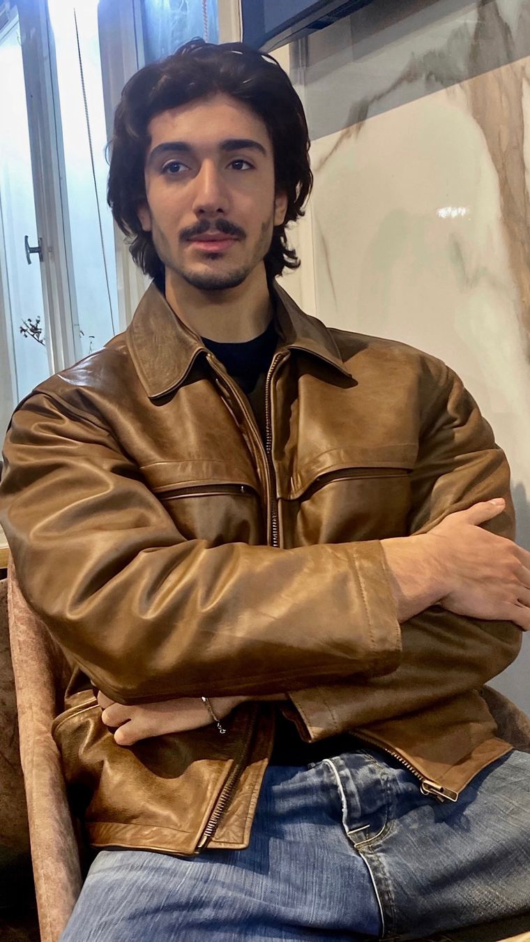Hazem Telmoudi in a leather jacket